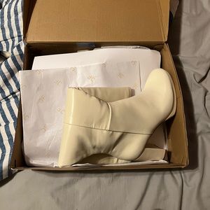 Bone white heeled boots